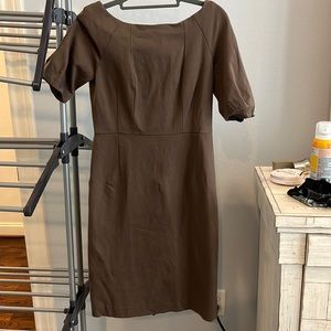 Brown Banana Republic dress with a low-ish back. Flattering for a woman’s shape
